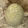 Bild på Drejat ägg koppargrön